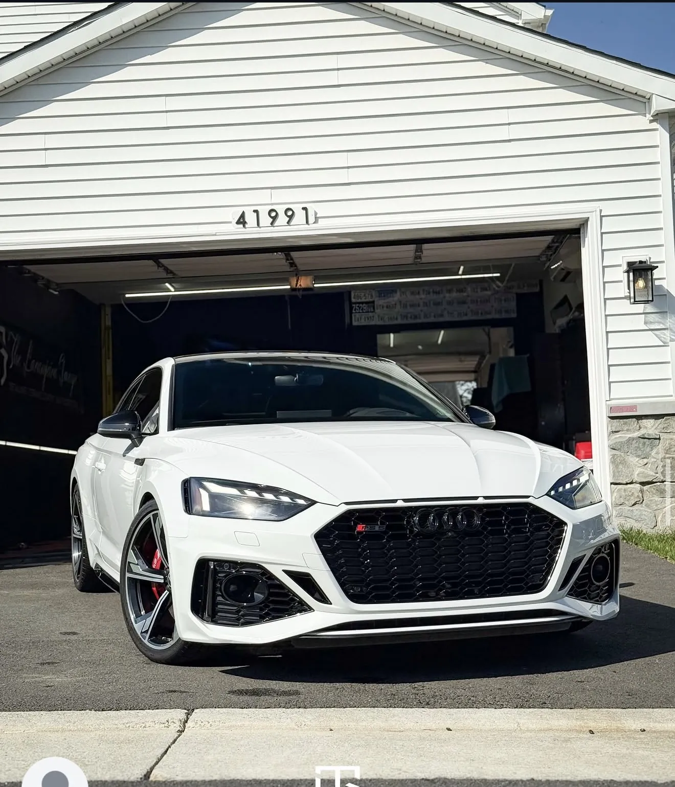 White Audi RS5 after a maintenance detail