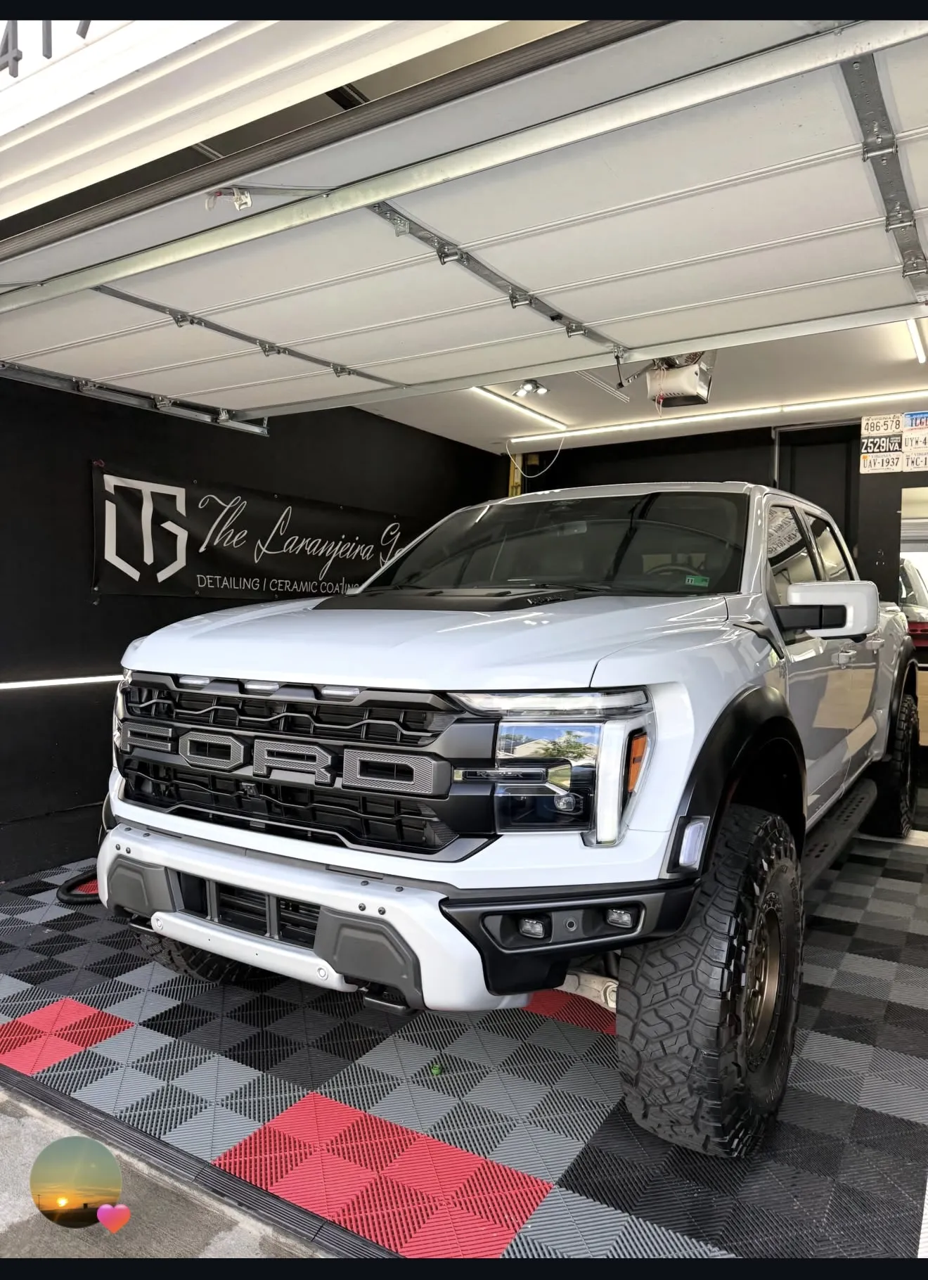 White Ford F-150 Raptor after a ceramic maintenance detail